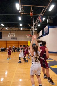 Abigail Nielsen finished with a solid eighteen points, five rebounds, and two steals in the 74-65 win by SMCC over Dean College.