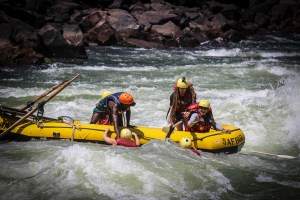 Rafting the Zambezi River, this is Rapid 18 which normally capsizes 95 percent of rafts. Author in front of raft.  Photo  SafPar Rafting