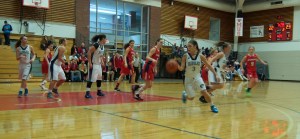 Destinie Montano gains control of the ball in first half action against UNB-St. John’s Sunday. Destinie finished the day with a modest 4 points while dishing out 4 assist.